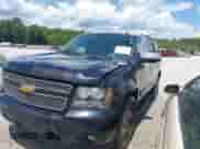 2012 Chevrolet Tahoe LT with VIN 1GNSCBE05CR211898, listed as a IAAI auction lot 42612993 with 233,367 mi miles and . Bid and sale history available at DreamBid. Image 2.