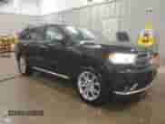 2018 Dodge Durango Citadel Anodized Platinum with VIN 1C4RDJEGXJC182877, listed as a Copart auction lot 83068134 with 84,545 mi miles and Salvage title. Bid and sale history available at DreamBid. Image 4.