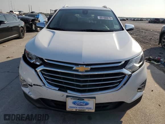 2018 Chevrolet Equinox Premier with VIN 2GNAXMEV7J6214978, listed as a Copart auction lot 69108875 with 63,716 mi miles and Salvage title. Bid and sale history available at DreamBid. Image 5.