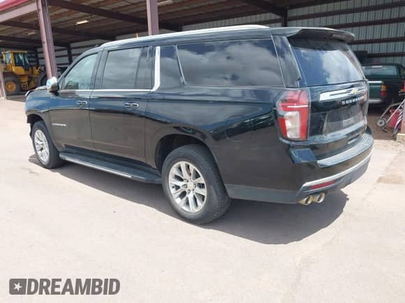2023 Chevrolet Suburban Premier with VIN 1GNSCFKD1PR410564, listed as a IAAI auction lot 42247001 with 23,048 mi miles and . Bid and sale history available at DreamBid. Image 3.