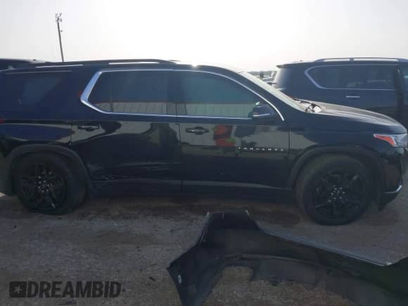 2020 Chevrolet Traverse LT with VIN 1GNERHKW0LJ125677, listed as a IAAI auction lot 42252616 with 77,039 mi miles and . Bid and sale history available at DreamBid. Image 13.