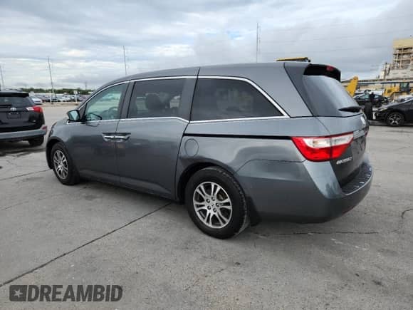 2012 Honda Odyssey EX with VIN 5FNRL5H47CB060642, listed as a Copart auction lot 82143945 with 75,909 mi miles and Salvage title. Bid and sale history available at DreamBid. Image 2.
