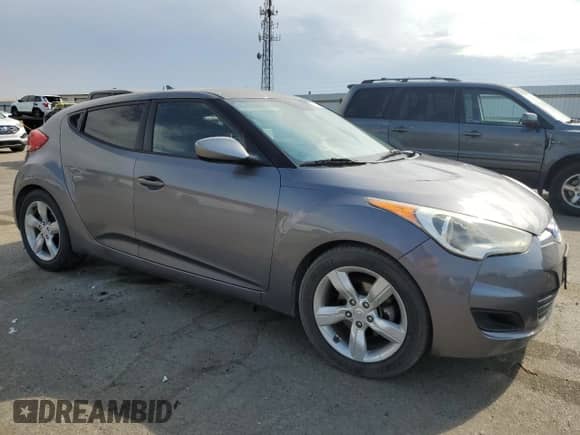 2013 Hyundai Veloster w/Black Int z VIN KMHTC6AD9DU095127, wystawiony jako Copart lot #70422785 z przebiegiem 188 309 mil mil oraz Szkoda całkowita • Salvage title. Historia ofert i sprzedaży dostępna na DreamBid. Obrazek 4.