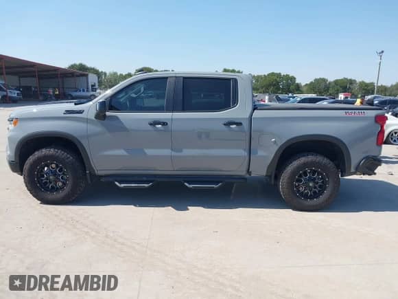 2024 Chevrolet Silverado 1500 LT Trail Boss with VIN 3GCUDFEL7RG174863, listed as a IAAI auction lot 43136773 with 12,714 mi miles and . Bid and sale history available at DreamBid. Image 14.