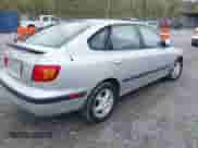 2003 Hyundai Elantra GT z VIN KMHDN55D13U099447, wystawiony jako IAAI lot #41973749 z przebiegiem 200 923 mil mil oraz . Historia ofert i sprzedaży dostępna na DreamBid. Obrazek 4.