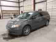 2013 Honda Odyssey EX-L with VIN 5FNRL5H64DB086473, listed as a IAAI auction lot 43502520 with 135,755 mi miles and . Bid and sale history available at DreamBid. Image 2.