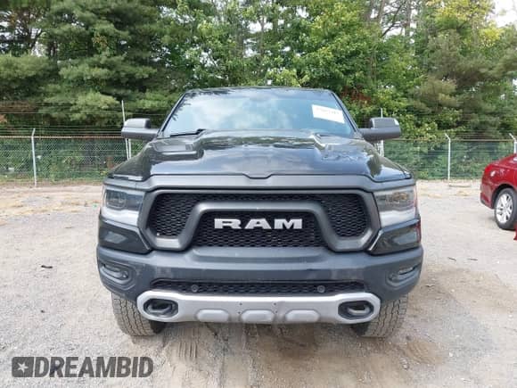 2019 Ram 1500 Rebel z VIN 1C6SRFET2KN705108, wystawiony jako IAAI lot #43163417 z przebiegiem 110 932 mil mil oraz . Historia ofert i sprzedaży dostępna na DreamBid. Obrazek 12.