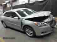 2015 Chevrolet Malibu LT z VIN 1G11C5SL1FU149138, wystawiony jako IAAI lot #43108545 z przebiegiem 127 111 mil mil oraz . Historia ofert i sprzedaży dostępna na DreamBid. Obrazek 13.