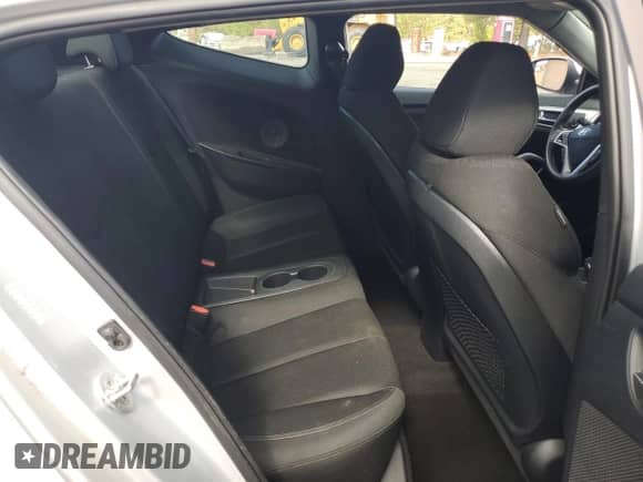 2016 Hyundai Veloster z VIN KMHTC6AD0GU304212, wystawiony jako Copart lot #86447825 z przebiegiem 98 959 mil mil oraz Czysty tytuł • Clean title. Historia ofert i sprzedaży dostępna na DreamBid. Obrazek 10.