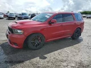 2020 Dodge Durango SRT with VIN 1C4SDJGJ0LC187759, listed as a Copart auction lot 61428735 with 107,028 mi miles and Salvage title. Bid and sale history available at DreamBid. Image 1.