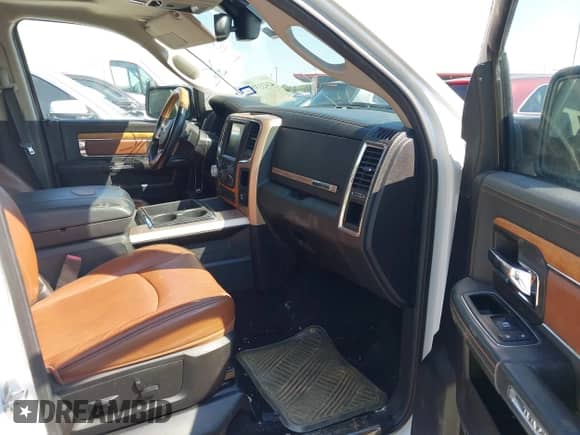 2014 Ram 1500 Longhorn with VIN 1C6RR7PT1ES143869, listed as a IAAI auction lot 43433379 with 131,727 mi miles and . Bid and sale history available at DreamBid. Image 5.