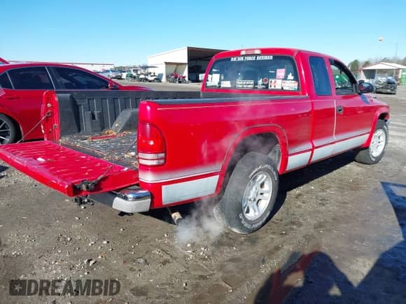 2004 Dodge Dakota SLT with VIN 1D7GL42N24S589414, listed as a IAAI auction lot 41219286 with 145,851 mi miles and . Bid and sale history available at DreamBid. Image 4.