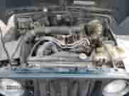 2003 Jeep Wrangler Rubicon с VIN 1J4FA69S43P327618, выставлен на аукционе Copart как лот 70574135 с пробегом 111 917 миль миль и Списание • Salvage title. История ставок и продаж доступна на DreamBid. Изображение 11.