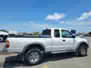 2003 Toyota Tacoma PreRunner with VIN 5TESM92N33Z208971, listed as a Copart auction lot 65647325 with 163,509 mi miles and Salvage title. Bid and sale history available at DreamBid. Image 3.