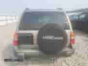 2003 Chevrolet Tracker with VIN 2CNBJ13C936947062, listed as a Copart auction lot 59820603 with 65,344 mi miles and Salvage title. Bid and sale history available at DreamBid. Image 6.