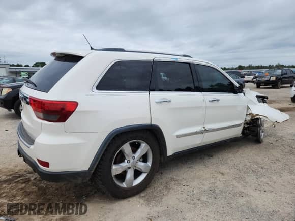 2012 Jeep Grand Cherokee Overland z VIN 1C4RJFCG8CC325367, wystawiony jako Copart lot #66274415 z przebiegiem 149 290 mil mil oraz Szkoda całkowita • Salvage title. Historia ofert i sprzedaży dostępna na DreamBid. Obrazek 3.