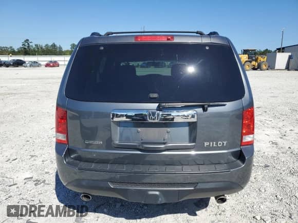 2012 Honda Pilot Touring with VIN 5FNYF3H97CB016448, listed as a Copart auction lot 82044975 with 154,055 mi miles and Salvage title. Bid and sale history available at DreamBid. Image 6.