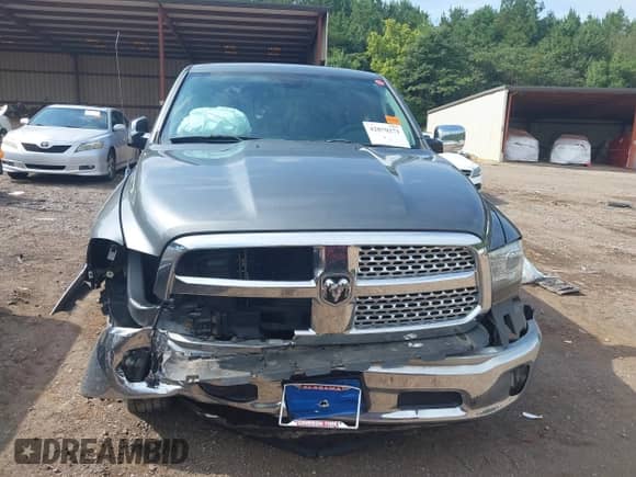 2013 Ram 1500 Laramie with VIN 1C6RR7NT1DS571846, listed as a IAAI auction lot 42870271 with 171,715 mi miles and . Bid and sale history available at DreamBid. Image 6.