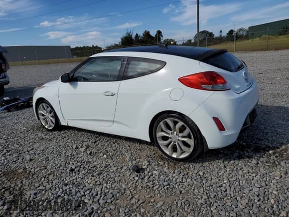 2012 Hyundai Veloster w/Gray Int z VIN KMHTC6AD0CU056764, wystawiony jako Copart lot #84646725 z przebiegiem 157 456 mil mil oraz Czysty tytuł • Clean title. Historia ofert i sprzedaży dostępna na DreamBid. Obrazek 2.