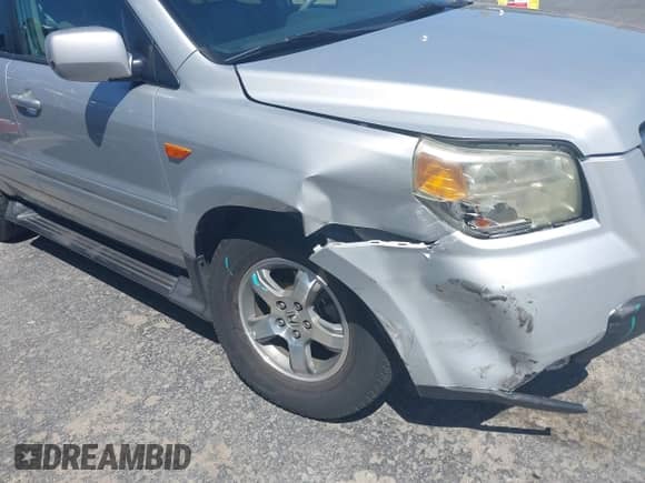 2006 Honda Pilot EX-L z VIN 5FNYF28776B042240, wystawiony jako IAAI lot #41999746 z przebiegiem 205 796 mil mil oraz . Historia ofert i sprzedaży dostępna na DreamBid. Obrazek 6.