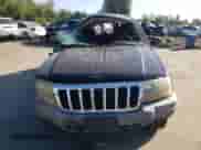 2002 Jeep Grand Cherokee Laredo with VIN 1J4GW48S82C128797, listed as a Copart auction lot 64885725 with 167,701 mi miles and Non repairable. Bid and sale history available at DreamBid. Image 5.