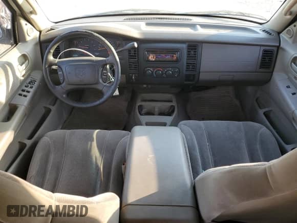 2001 Dodge Dakota Sport z VIN 1B7HG2AN41S302353, wystawiony jako Copart lot #58349225 z przebiegiem 215 984 mil mil oraz Szkoda całkowita • Salvage title. Historia ofert i sprzedaży dostępna na DreamBid. Obrazek 8.