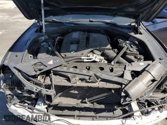 2011 BMW 7 Series 740i with VIN WBAKA4C55BC613170, listed as a Copart auction lot 68973425 with 127,434 mi miles and Salvage title. Bid and sale history available at DreamBid. Image 11.