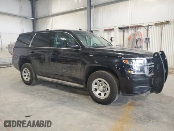 2018 Chevrolet Tahoe Commercial с VIN 1GNSKFEC4JR124379, выставлен на аукционе Copart как лот 53070765 с пробегом 106 942 миль миль и Списание • Salvage title. История ставок и продаж доступна на DreamBid. Изображение 4.