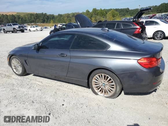 2014 BMW 4 Series 428i с VIN WBA3N3C57EF711008, выставлен на аукционе Copart как лот 85096145 с пробегом 196 057 миль миль и Чистый • Clean title. История ставок и продаж доступна на DreamBid. Изображение 2.
