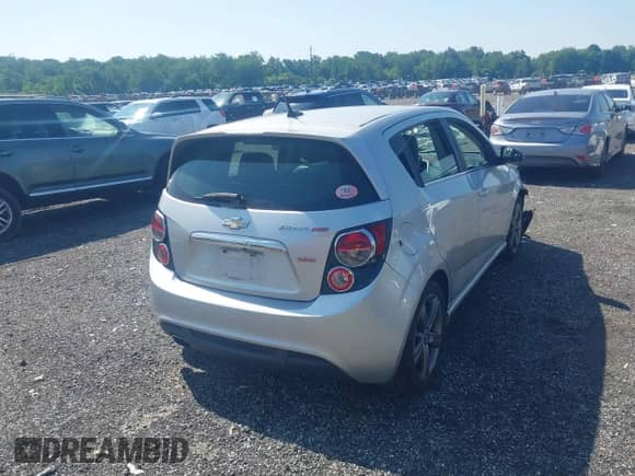 2014 Chevrolet Sonic RS with VIN 1G1JG6SB4E4234698, listed as a IAAI auction lot 42553027 with 149,958 mi miles and . Bid and sale history available at DreamBid. Image 4.