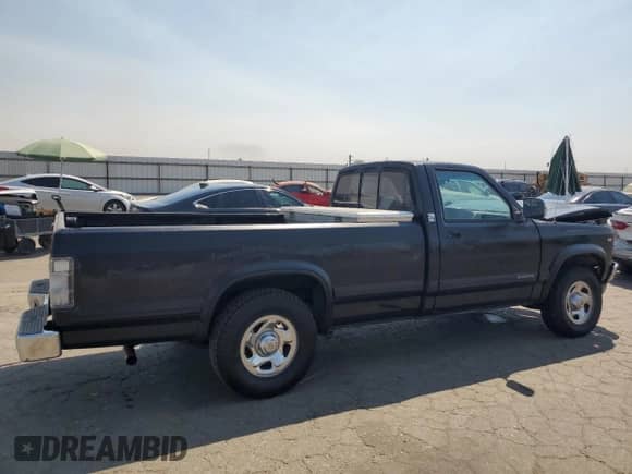 1995 Dodge Dakota S с VIN 1B7GL26X1SS201015, выставлен на аукционе Copart как лот 71497875 с пробегом 174 758 миль миль и Списание • Salvage title. История ставок и продаж доступна на DreamBid. Изображение 3.