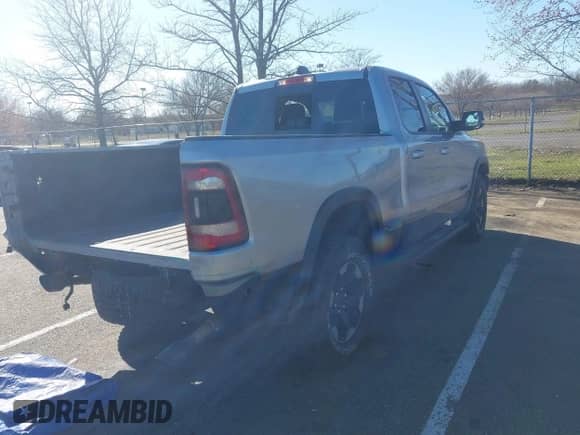 2019 Ram 1500 Rebel with VIN 1C6SRFET2KN671753, listed as a IAAI auction lot 41889166 with 72,883 mi miles and . Bid and sale history available at DreamBid. Image 4.