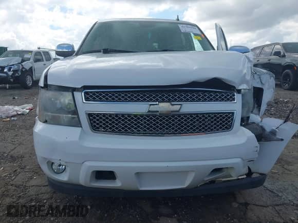 2009 Chevrolet Tahoe LTZ with VIN 1GNFC33099J123390, listed as a IAAI auction lot 42793918 with 206,967 mi miles and . Bid and sale history available at DreamBid. Image 17.