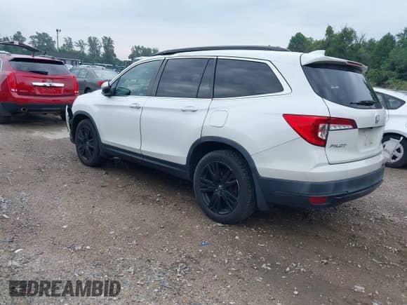 2021 Honda Pilot Special Edition with VIN 5FNYF6H22MB034734, listed as a IAAI auction lot 43291080 with 162,677 mi miles and . Bid and sale history available at DreamBid. Image 3.