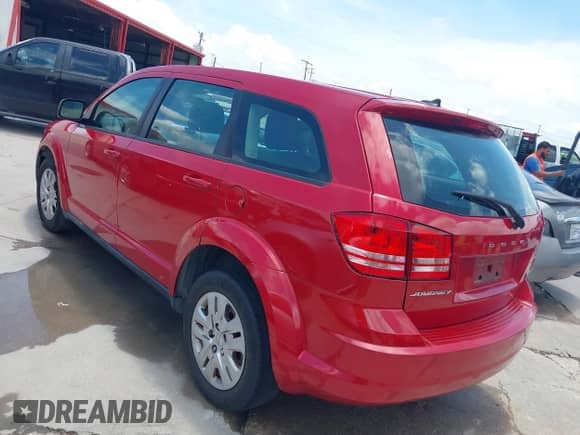 2014 Dodge Journey SE z VIN 3C4PDCABXET258671, wystawiony jako IAAI lot #42714929 z przebiegiem 247 599 mil mil oraz . Historia ofert i sprzedaży dostępna na DreamBid. Obrazek 3.