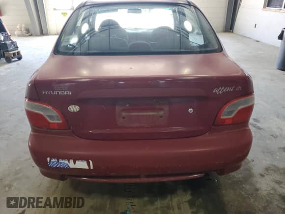 1999 Hyundai Accent GL z VIN KMHVF24N5XU575750, wystawiony jako Copart lot #52190805 z przebiegiem 205 655 mil mil oraz Czysty tytuł • Clean title. Historia ofert i sprzedaży dostępna na DreamBid. Obrazek 6.