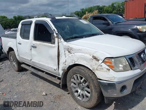 2009 Nissan Frontier SE with VIN 1N6AD07U19C427701, listed as a IAAI auction lot 42613374 with 164,412 mi miles and . Bid and sale history available at DreamBid. Image 1.
