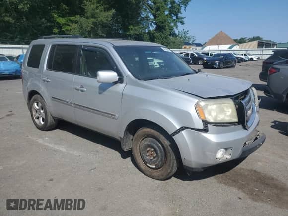 2009 Honda Pilot Touring with VIN 5FNYF48829B024561, listed as a Copart auction lot 66168365 with 150,536 mi miles and Salvage title. Bid and sale history available at DreamBid. Image 4.