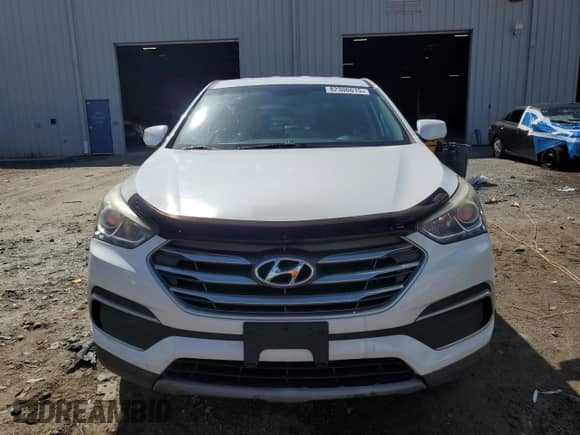 2018 Hyundai Santa Fe 2.4L z VIN 5XYZTDLB0JG564777, wystawiony jako Copart lot #82300615 z przebiegiem 137 081 mil mil oraz Szkoda całkowita • Salvage title. Historia ofert i sprzedaży dostępna na DreamBid. Obrazek 5.