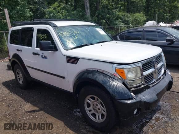 2011 Dodge Nitro SE with VIN 1D4PT2GK6BW590135, listed as a IAAI auction lot 42885591 with 192,411 mi miles and . Bid and sale history available at DreamBid. Image 1.