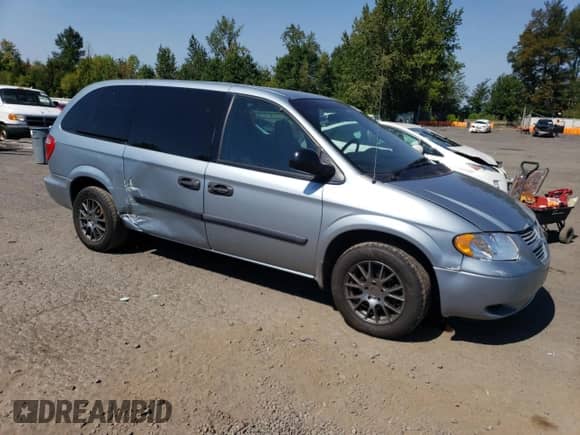2005 Dodge Caravan SE with VIN 1D4GP24R05B119440, listed as a Copart auction lot 70801585 with 162,198 mi miles and Salvage title. Bid and sale history available at DreamBid. Image 4.