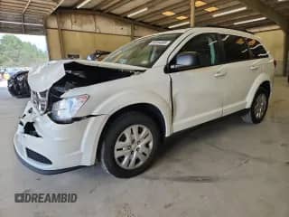 2016 Dodge Journey SE with VIN 3C4PDDAG9GT227481, listed as a Copart auction lot 68394085 with 103,332 mi miles and Salvage title. Bid and sale history available at DreamBid. Image 1.