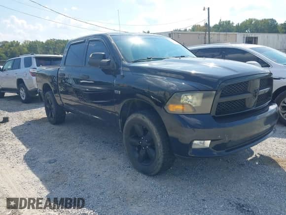 2012 Ram 1500 Express z VIN 1C6RD7KT4CS165867, wystawiony jako IAAI lot #43094521 z przebiegiem 154 519 mil mil oraz . Historia ofert i sprzedaży dostępna na DreamBid. Obrazek 1.