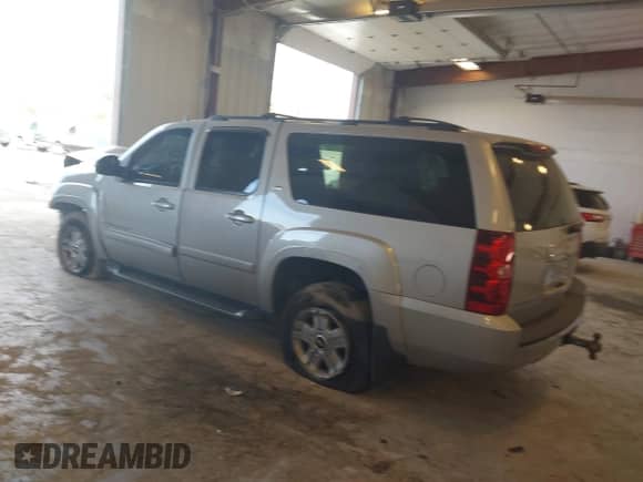 2009 Chevrolet Suburban 2LT z VIN 1GNFK26369R240705, wystawiony jako IAAI lot #43364816 z przebiegiem Nie podano mil oraz . Historia ofert i sprzedaży dostępna na DreamBid. Obrazek 3.