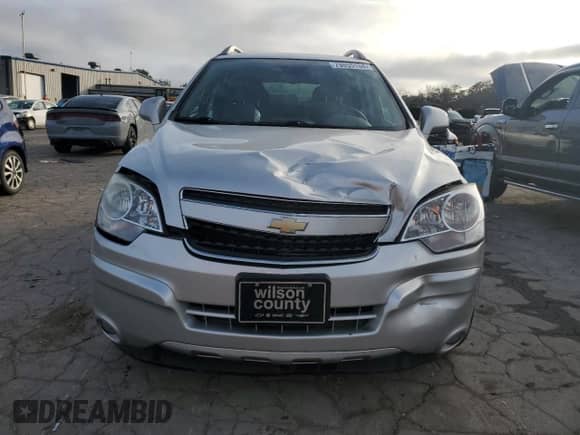 2014 Chevrolet Captiva Sport LT z VIN 3GNAL3EK8ES645994, wystawiony jako Copart lot #79855134 z przebiegiem 114 309 mil mil oraz Szkoda całkowita • Salvage title. Historia ofert i sprzedaży dostępna na DreamBid. Obrazek 5.