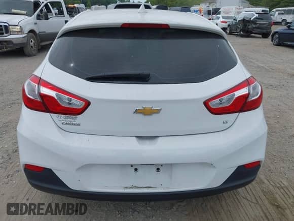 2018 Chevrolet Cruze LT with VIN 3G1BE6SM8JS527686, listed as a IAAI auction lot 43103541 with 64,399 mi miles and . Bid and sale history available at DreamBid. Image 16.