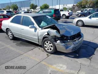 2000 Toyota Camry LE z VIN JT2BF22K2Y0285516, wystawiony jako IAAI lot #42934677 z przebiegiem 190 784 mil mil oraz . Historia ofert i sprzedaży dostępna na DreamBid. Obrazek 1.