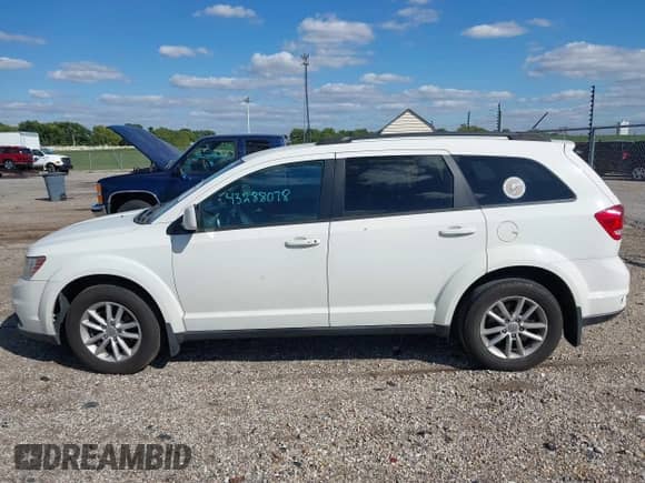 2014 Dodge Journey SXT with VIN 3C4PDCBG7ET101268, listed as a IAAI auction lot 43288078 with 257,620 mi miles and . Bid and sale history available at DreamBid. Image 14.