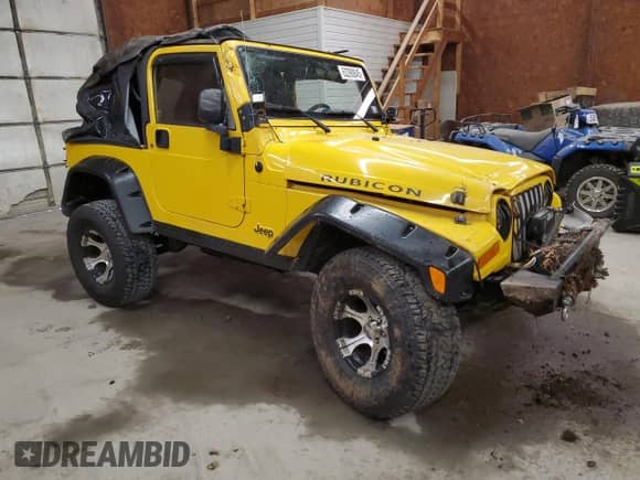 2005 Jeep Wrangler Rubicon with VIN 1J4FA69S05P384188, listed as a Copart auction lot 63390845 with 194,631 mi miles and Salvage title. Bid and sale history available at DreamBid. Image 4.