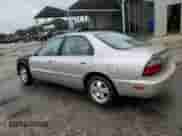 1997 Honda Accord Special Edition with VIN 1HGCD5602VA240028, listed as a Copart auction lot 82034045 with 207,053 mi miles and Salvage title. Bid and sale history available at DreamBid. Image 2.